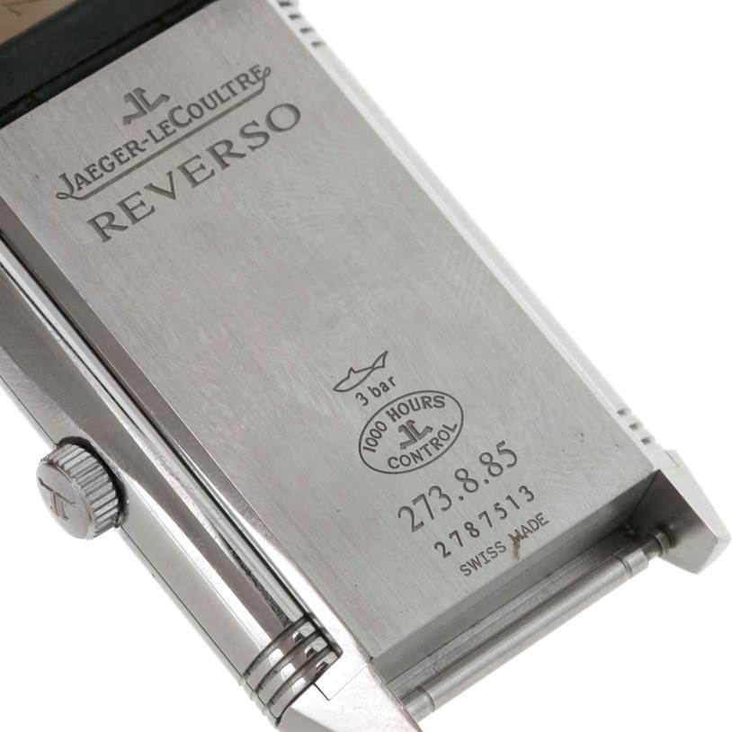 The image shows the back case of a Jaeger LeCoultre Reverso 273.8.85 Men
s Stainless Steel Silver Dial 273.8.85 Men
s Stainless Steel Silver Dial watch, including the crown and engraved details.