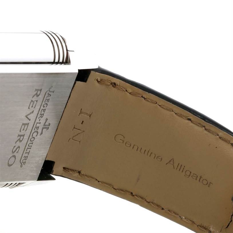 This image shows a close-up of the Jaeger-LeCoultre Reverso watch case and the genuine alligator leather strap.