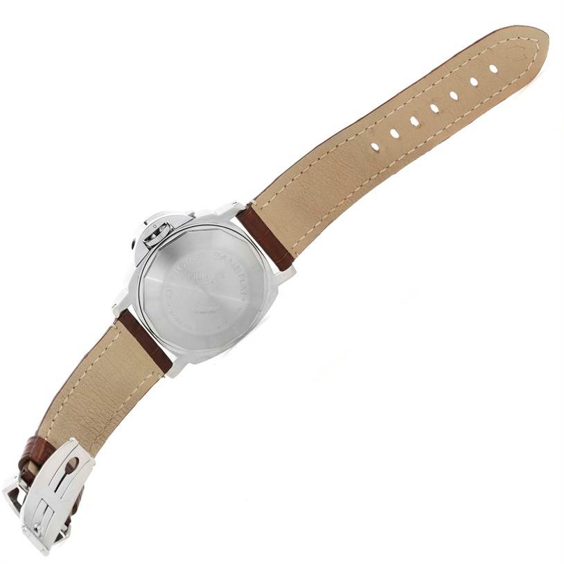 This image shows the back view of a Panerai Luminor PAM00090 Men
s Stainless Steel Black Dial PAM00090 Men
s Stainless Steel Black Dial watch, highlighting its case back and leather strap.