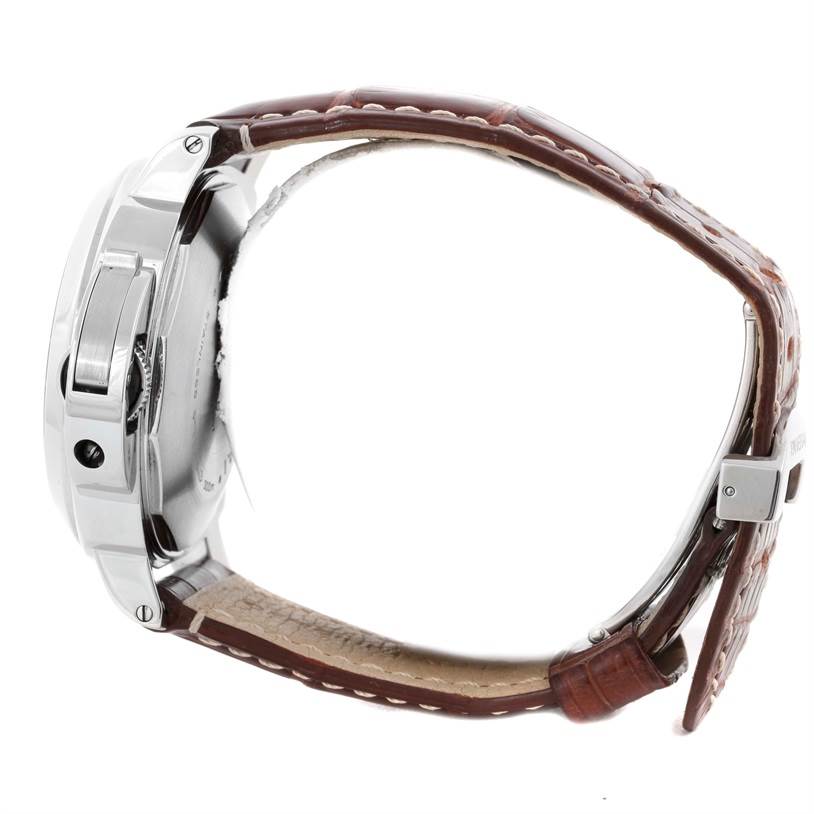 The image shows a side view of a Panerai Luminor PAM00090 Men
s Stainless Steel Black Dial PAM00090 Men
s Stainless Steel Black Dial watch with a visible brown leather strap and clasp.