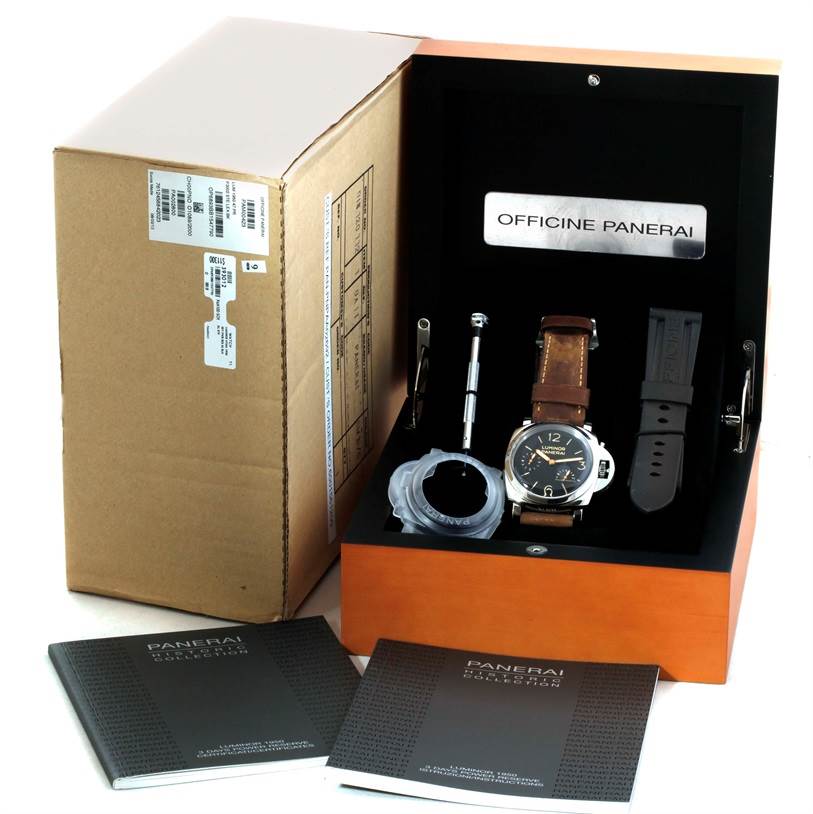 The image shows a Panerai Luminor PAM00423 Men's Stainless Steel Black Dial PAM00423 Men's Stainless Steel Black Dial watch with tools, a strap, and manuals inside an open watch box.