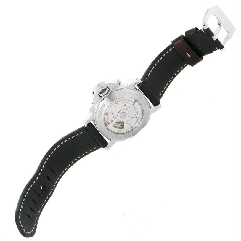 The Luminor model by Panerai is shown from the back, displaying its movement and the black leather strap with a buckle.