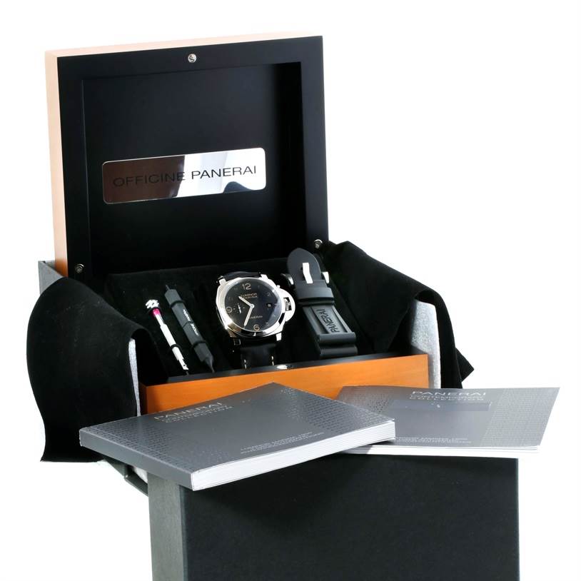 The image shows a Panerai Luminor PAM00359 Men's Stainless Steel Black Dial PAM00359 Men's Stainless Steel Black Dial watch set in its box, including a tool, extra strap, and manuals, viewed from a front angle.