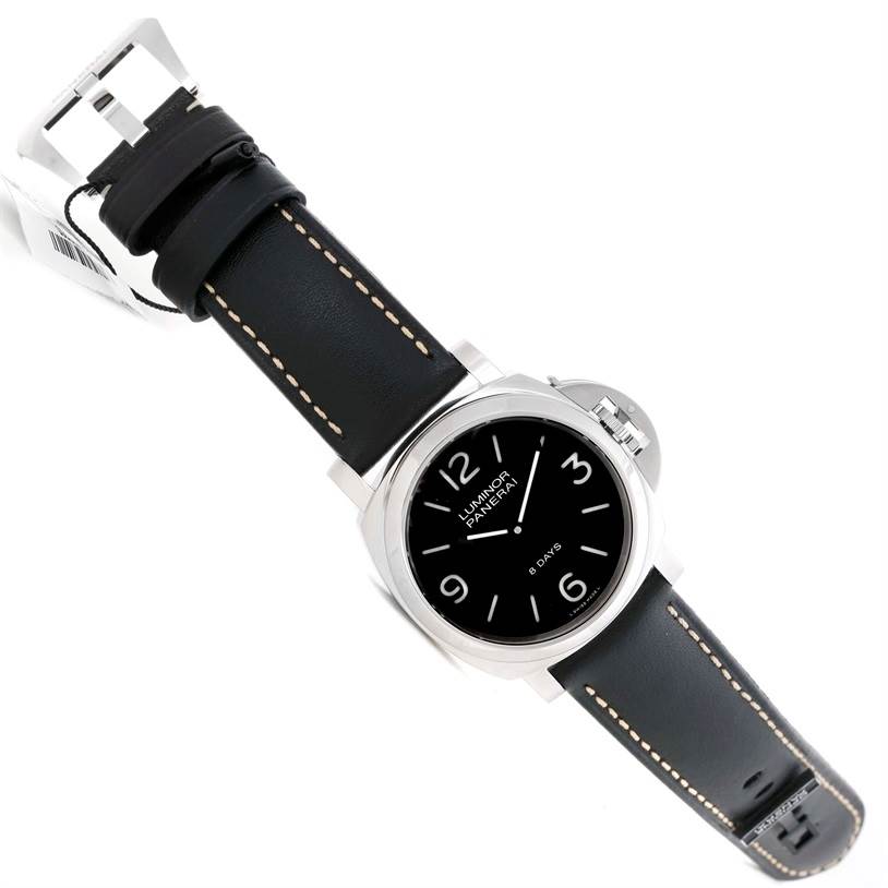 The image displays a top view of a Panerai Luminor PAM00560 Men's Stainless Steel Black Dial PAM00560 Men's Stainless Steel Black Dial watch, showing its black face, leather strap, and distinctive crown guard.