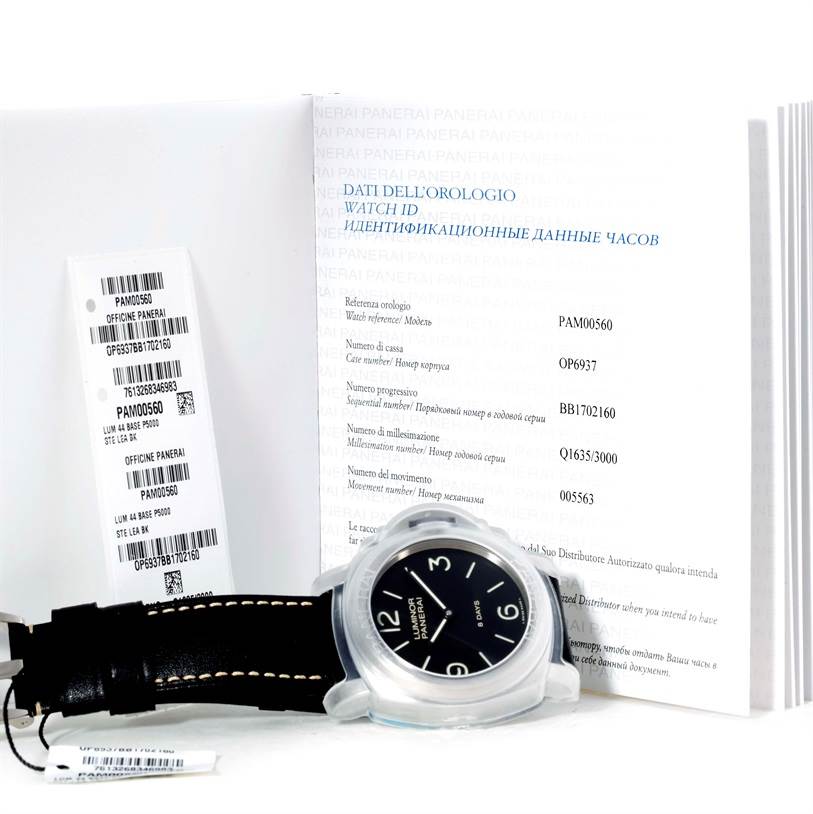The image shows a Panerai Luminor PAM00560 Men's Stainless Steel Black Dial PAM00560 Men's Stainless Steel Black Dial watch with documentation and tags, positioned at a slight angle facing up.