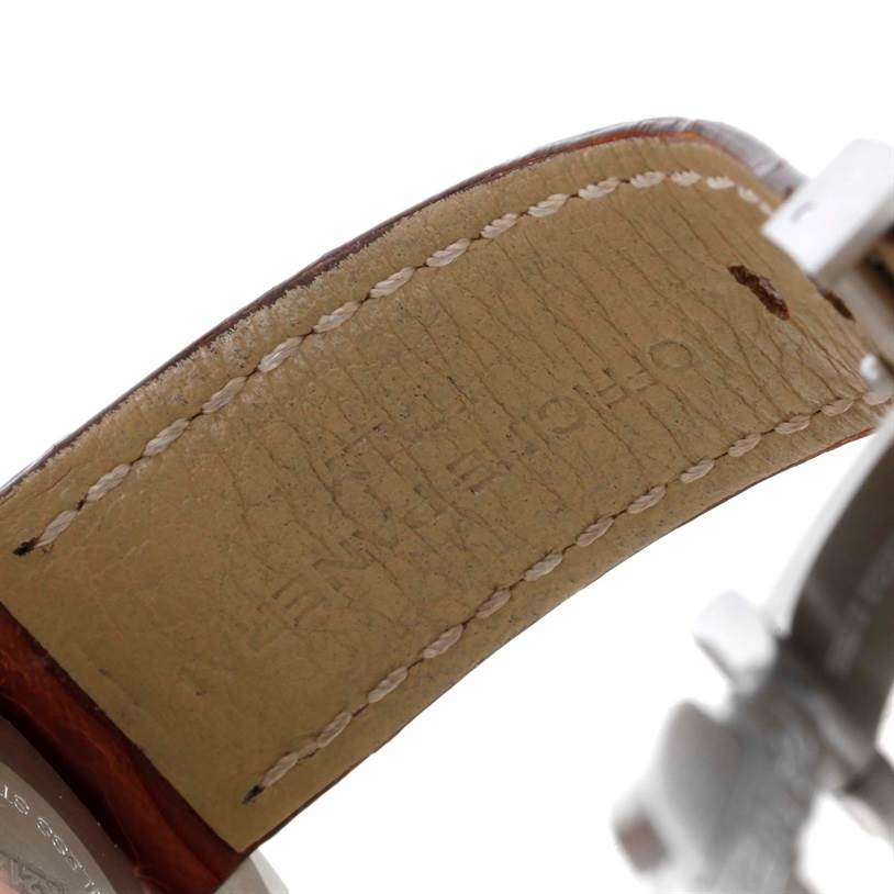 This image shows a close-up of the leather strap and part of the buckle of a Panerai Luminor PAM00048 Men
s Stainless Steel Black Dial PAM00048 Men
s Stainless Steel Black Dial watch from the underside.