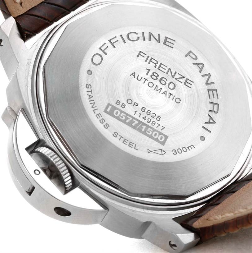 The image shows the back case and crown of the Panerai Luminor PAM00049 Men's Stainless Steel White Dial PAM00049 Men's Stainless Steel White Dial watch, highlighting its engravings and leather strap.