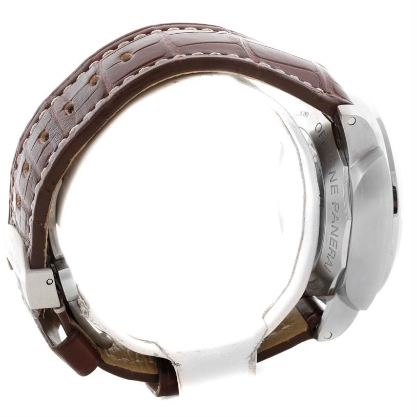 This image shows a side view of a Panerai Luminor PAM00347 Men's Stainless Steel Black Dial PAM00347 Men's Stainless Steel Black Dial watch highlighting its case and brown leather strap.