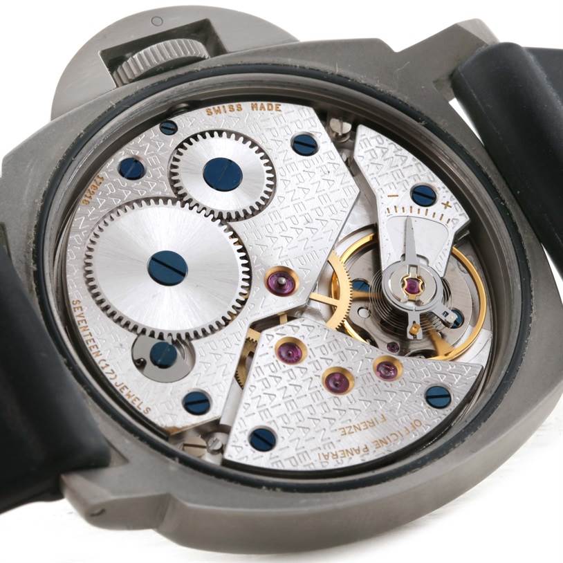 This image shows the back view of a Panerai Luminor PAM00055 Men
s Titanium Black Dial PAM00055 Men
s Titanium Black Dial watch, highlighting its intricate mechanical movement.