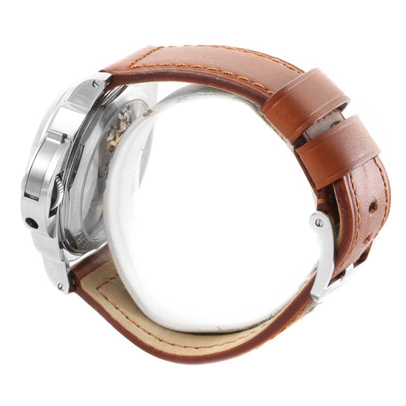 The image shows a side angle of a Panerai Luminor PAM00113 Men's Stainless Steel White Dial PAM00113 Men's Stainless Steel White Dial watch, highlighting its back case, crown, and brown leather strap.