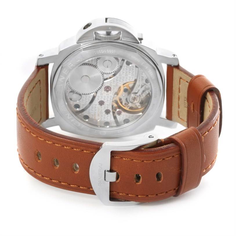 The image shows the back view of a Panerai Luminor PAM00113 Men's Stainless Steel White Dial PAM00113 Men's Stainless Steel White Dial watch, highlighting its internal mechanical components and brown leather strap.