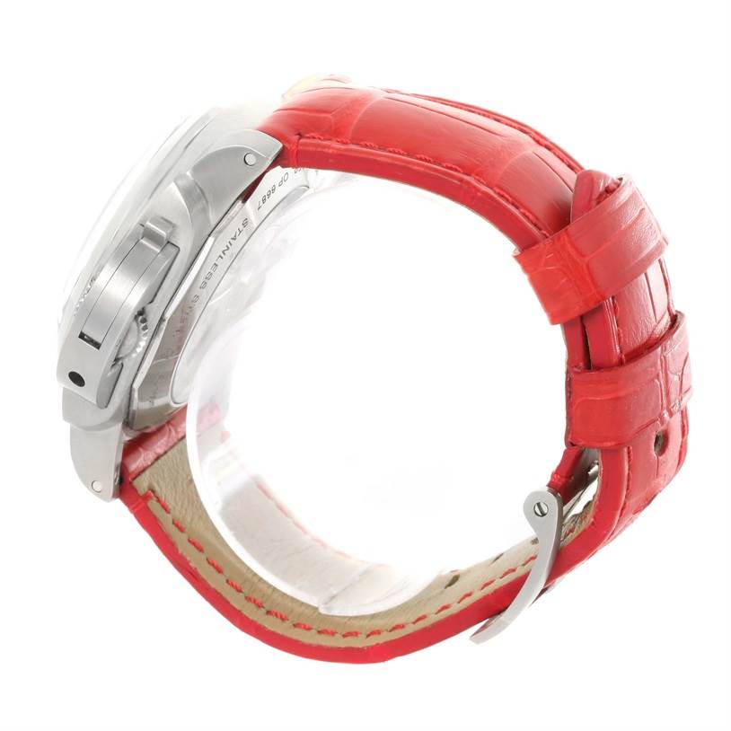 The image shows a side view of a Panerai Luminor PAM00270 Men's Stainless Steel Black Dial PAM00270 Men's Stainless Steel Black Dial watch with a red leather strap and visible crown guard.