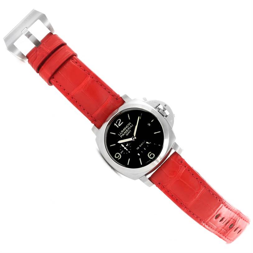 The image shows a Panerai Luminor PAM00270 Men's Stainless Steel Black Dial PAM00270 Men's Stainless Steel Black Dial watch with a red leather strap, viewed from a top angle.