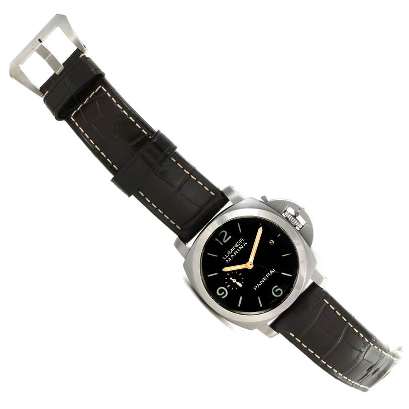 The Panerai Luminor PAM00351 Men
s Titanium Brown Dial PAM00351 Men
s Titanium Brown Dial watch is shown at a slight angle, featuring its face, black leather strap, and buckle.