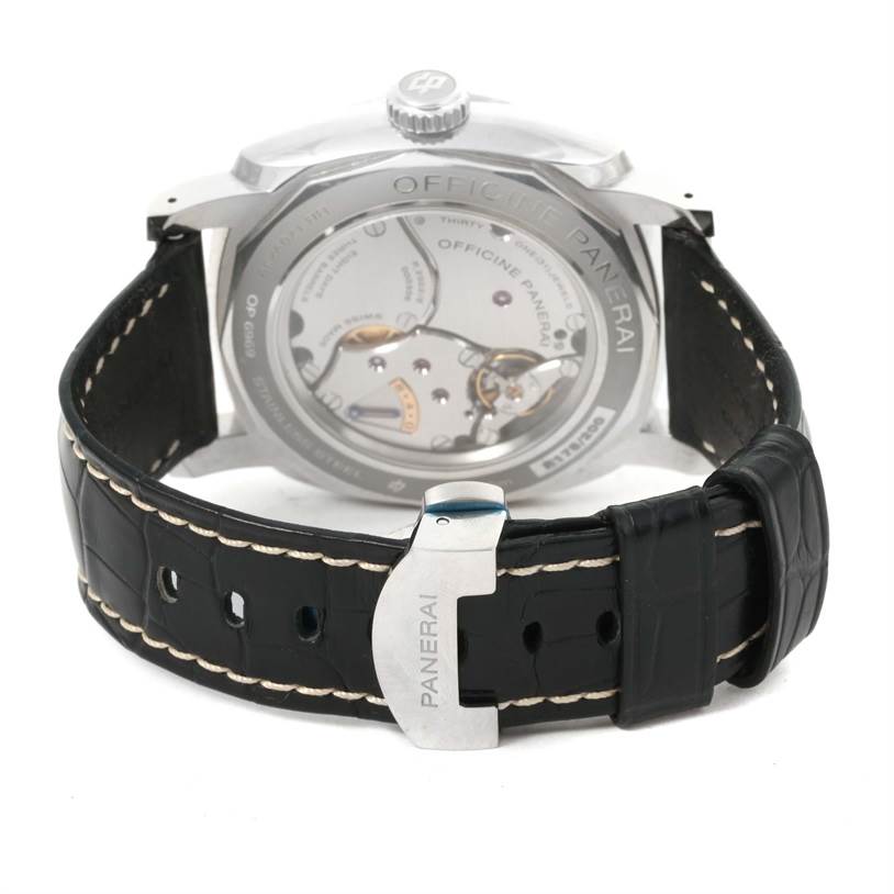 The image shows the back view of the Panerai Radiomir PAM00516 Men
s Stainless Steel Black Dial PAM00516 Men
s Stainless Steel Black Dial watch, highlighting the movement and the black leather strap with stitching.