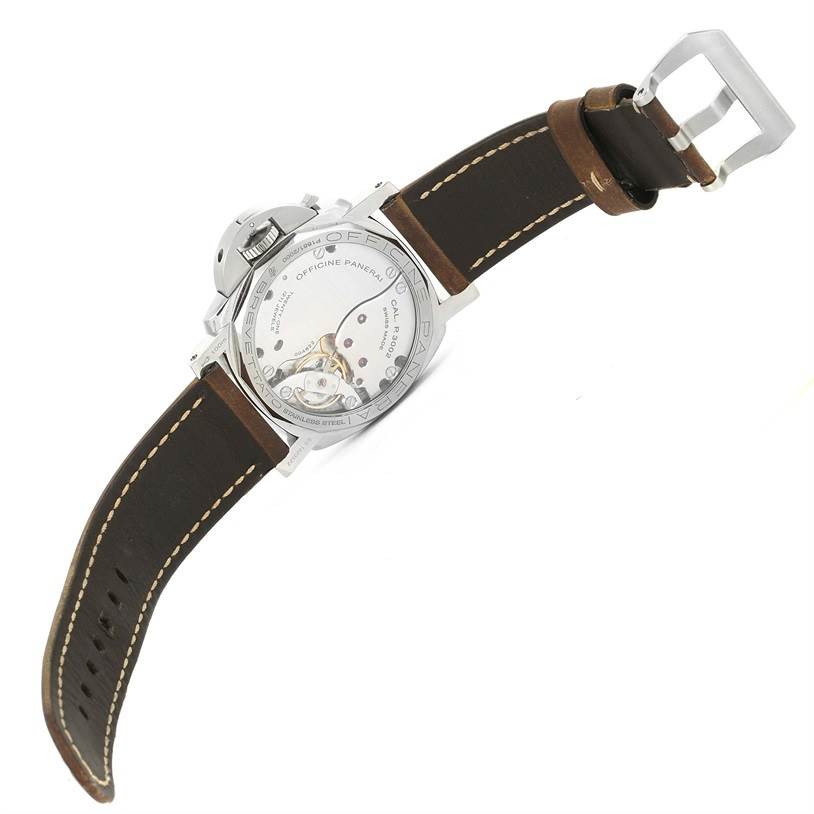 The image shows the back view of a Panerai Luminor PAM00423 Men's Stainless Steel Black Dial PAM00423 Men's Stainless Steel Black Dial watch, focusing on the movement and brown leather strap.