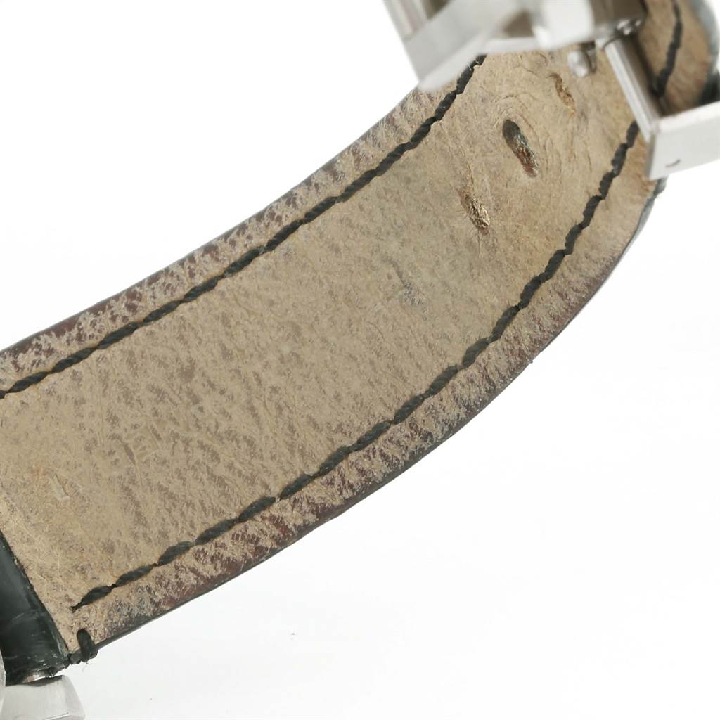 This image shows a close-up view of the leather strap and buckle of a Luminor model watch by Panerai.