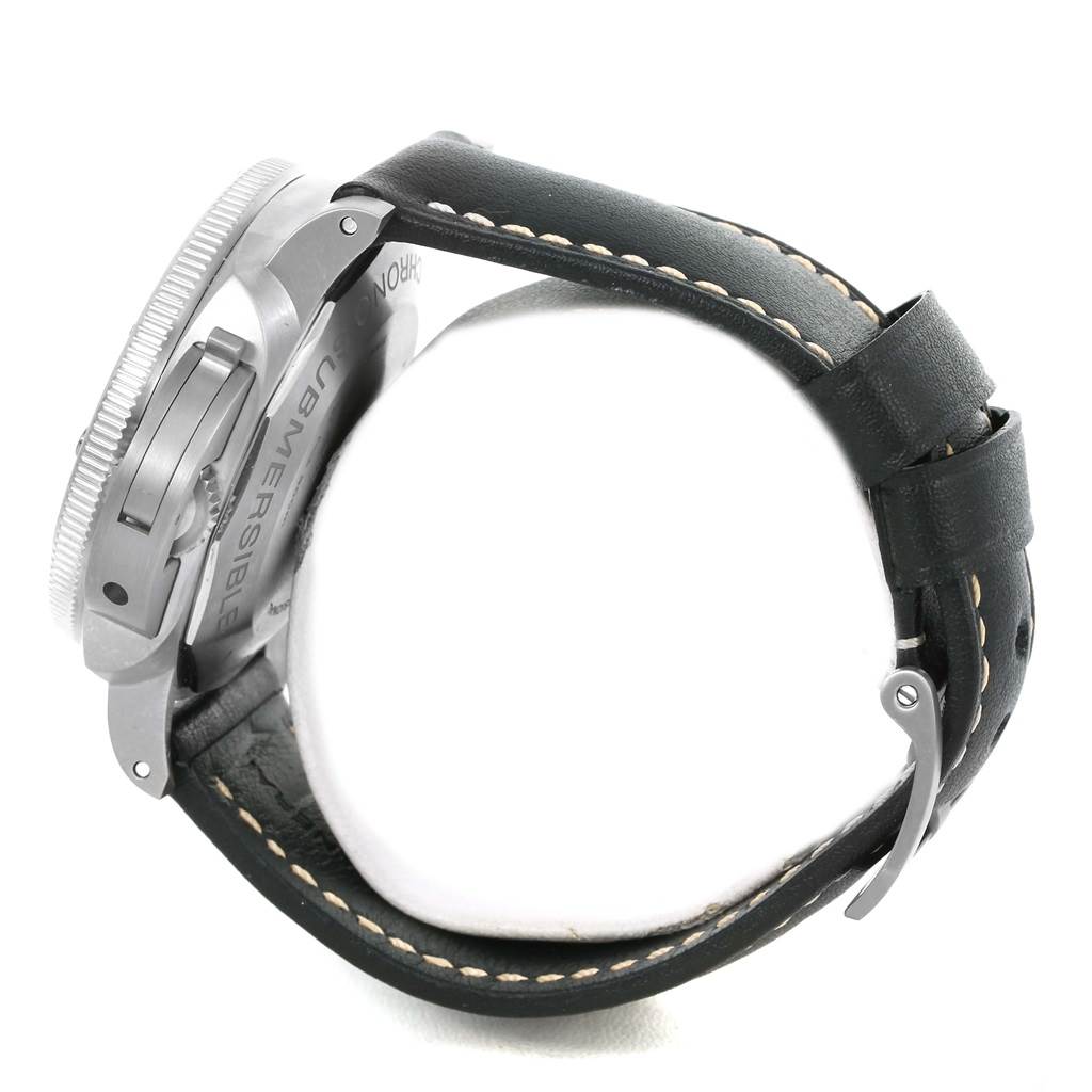 The image shows a side view of Panerai's Submersible model, highlighting its case, bezel, and leather strap.