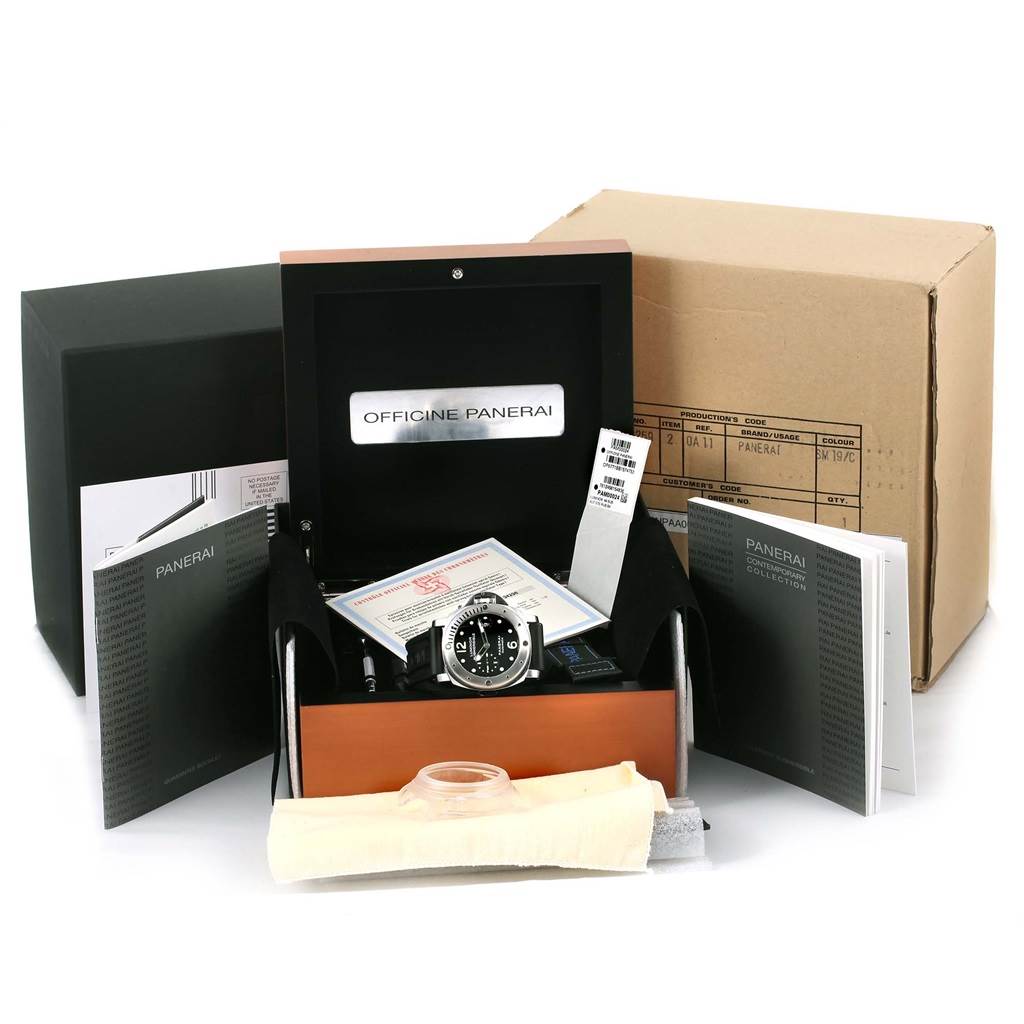 The image shows a top view of the Panerai Submersible PAM00024 Men's Titanium Black Dial PAM00024 Men's Titanium Black Dial watch with its box, paperwork, and accessories.