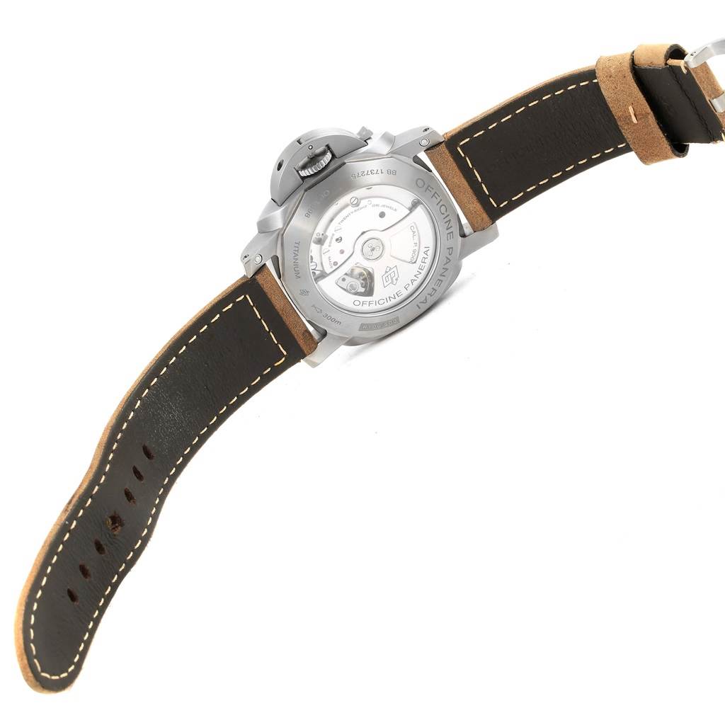 The image shows the rear side of the Panerai Luminor PAM00351 Men's Titanium Black Dial PAM00351 Men's Titanium Black Dial watch, highlighting its case back, movement, and leather strap.