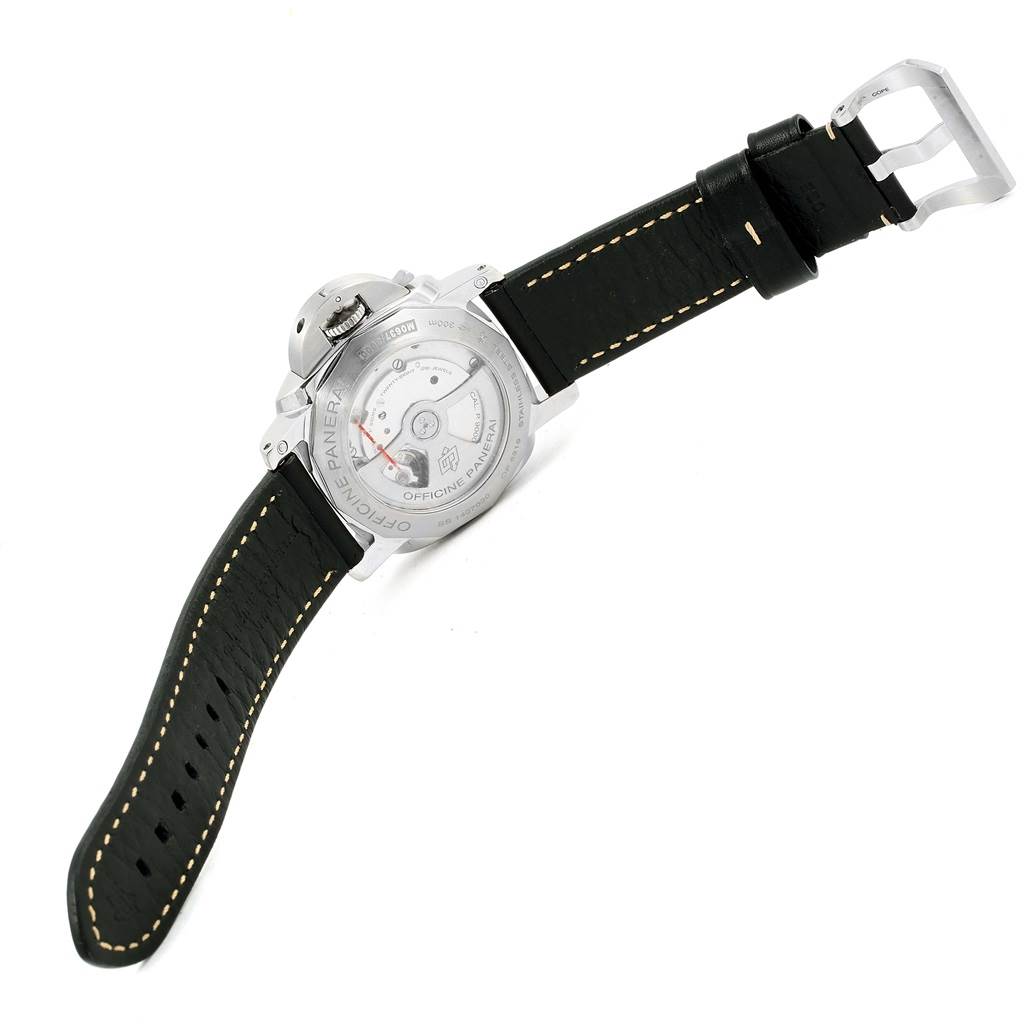 This image shows the back view of the Panerai Luminor PAM00359 Men
s Stainless Steel Black Dial PAM00359 Men
s Stainless Steel Black Dial watch with a partially open black leather strap and visible internal mechanism.