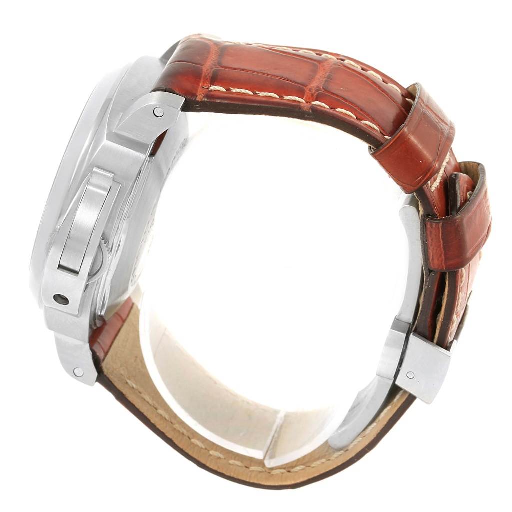 This image shows a side view of a Panerai Luminor PAM00104 Men's Stainless Steel Black Dial PAM00104 Men's Stainless Steel Black Dial watch focusing on its case, crown guard, and brown leather strap.