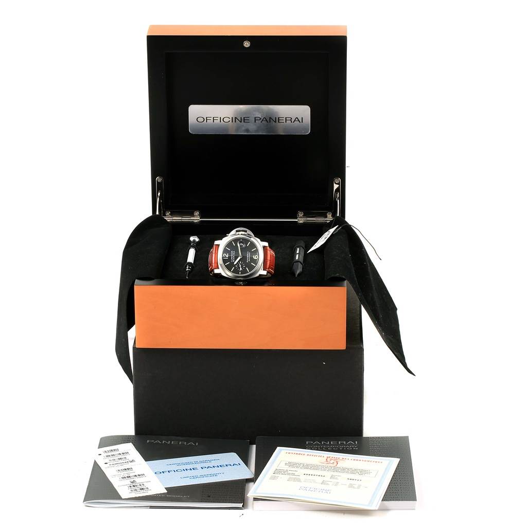 The image shows a Panerai Luminor PAM00104 Men's Stainless Steel Black Dial PAM00104 Men's Stainless Steel Black Dial watch and accessories from a front angle, including the watch box, tools, and manuals.