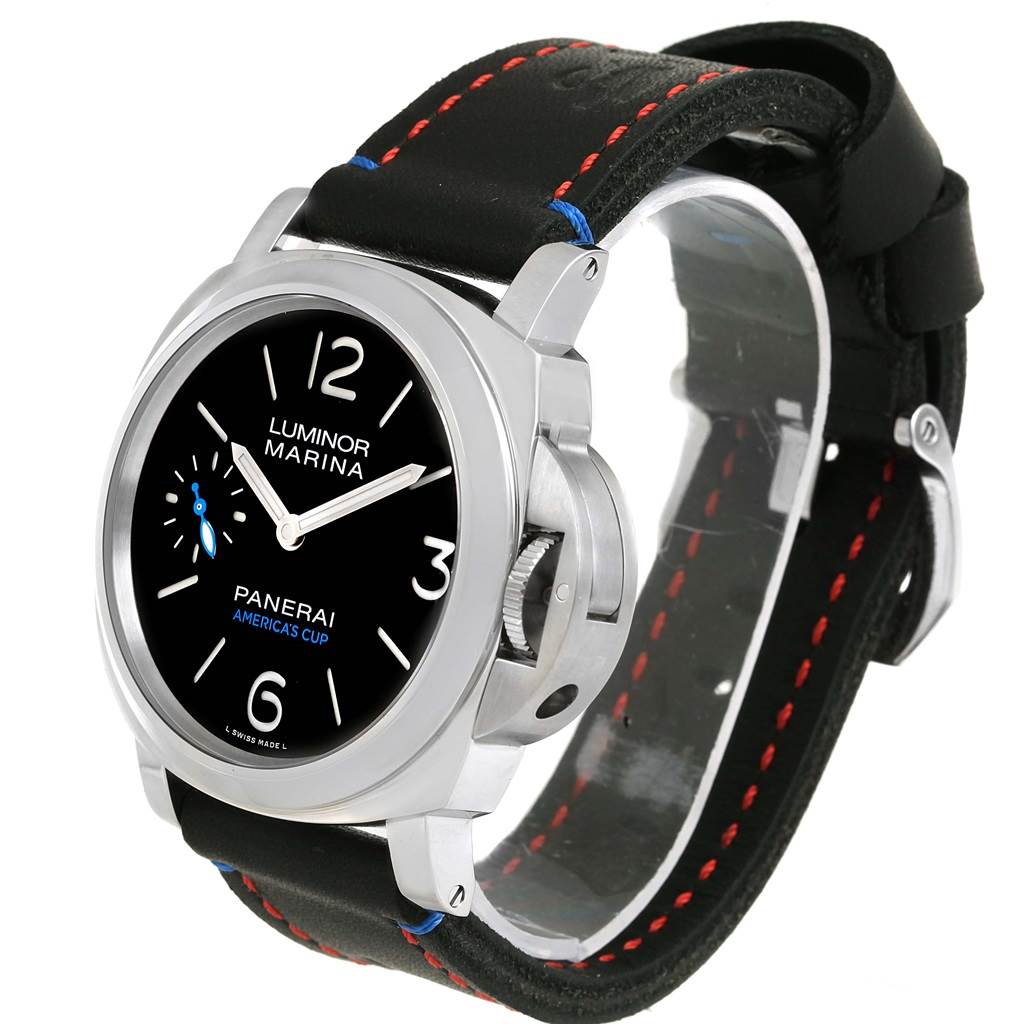 The image shows a Panerai Luminor PAM00724 Men's Stainless Steel Black Dial PAM00724 Men's Stainless Steel Black Dial Marina watch at an oblique angle, displaying its black dial, leather strap, and crown protection.