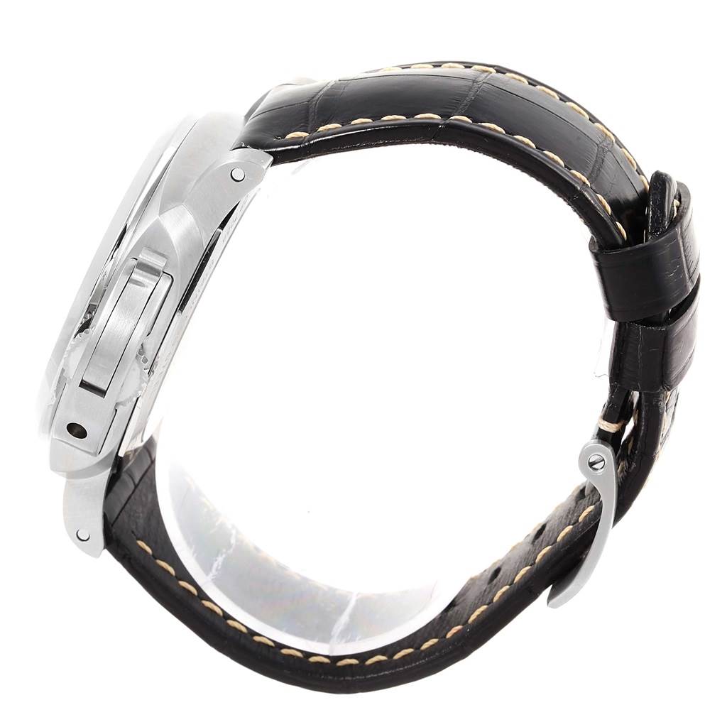 The image shows a side view of a Panerai Luminor PAM01392 Men
s Stainless Steel Black Dial PAM01392 Men
s Stainless Steel Black Dial watch emphasizing its leather strap and metal case.