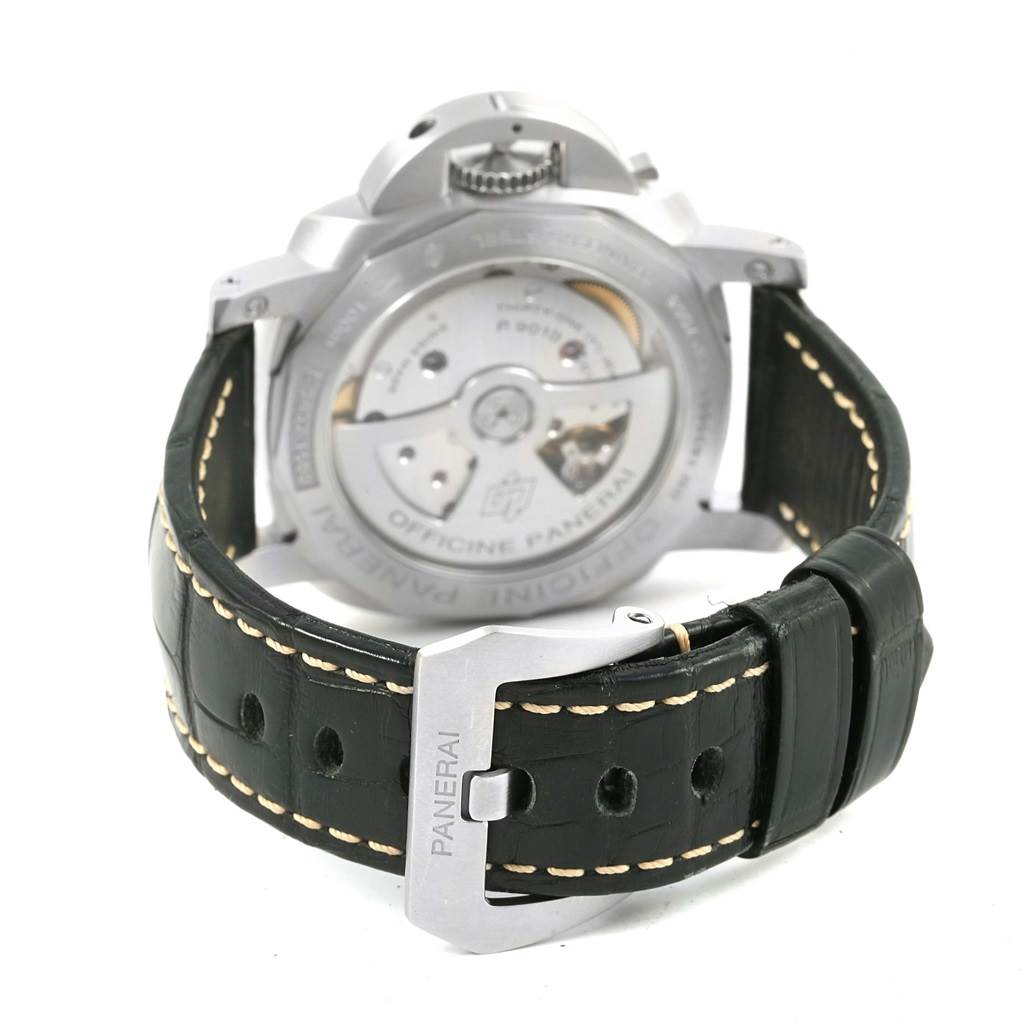 The image shows the back view of a Panerai Luminor PAM01392 Men
s Stainless Steel Black Dial PAM01392 Men
s Stainless Steel Black Dial watch, highlighting its automatic movement and leather strap with a Panerai-branded buckle.