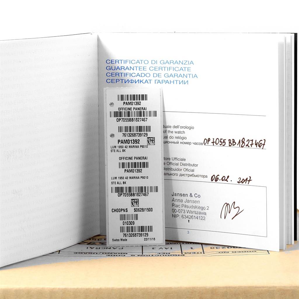 The image shows the guarantee certificate and documentation for a Panerai Luminor PAM01392 Men
s Stainless Steel Black Dial PAM01392 Men
s Stainless Steel Black Dial model watch, photographed at an angled open view.