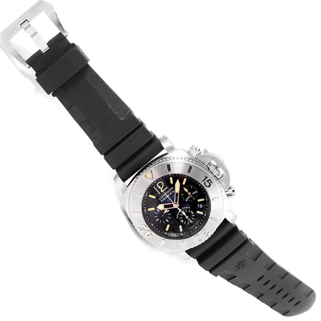 The Panerai Submersible PAM187 Men's Stainless Steel Black Dial PAM187 Men's Stainless Steel Black Dial watch is shown at an angle displaying the face, bezel, pushers, and black rubber strap.