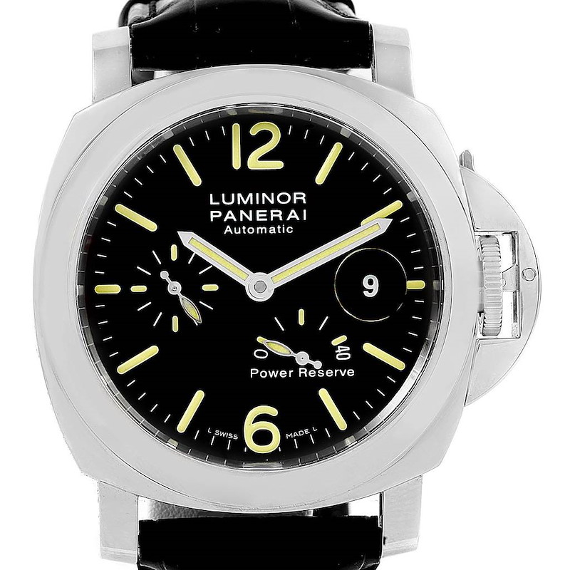 The image shows a Panerai Luminor watch from the front, highlighting its dial, hands, and power reserve indicator.