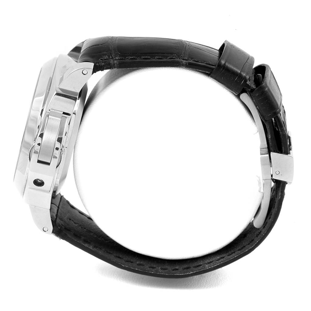 The image shows a side view of the Panerai Luminor PAM00090 Men's Stainless Steel Black Dial PAM00090 Men's Stainless Steel Black Dial watch, highlighting the case, crown guard, and leather strap.