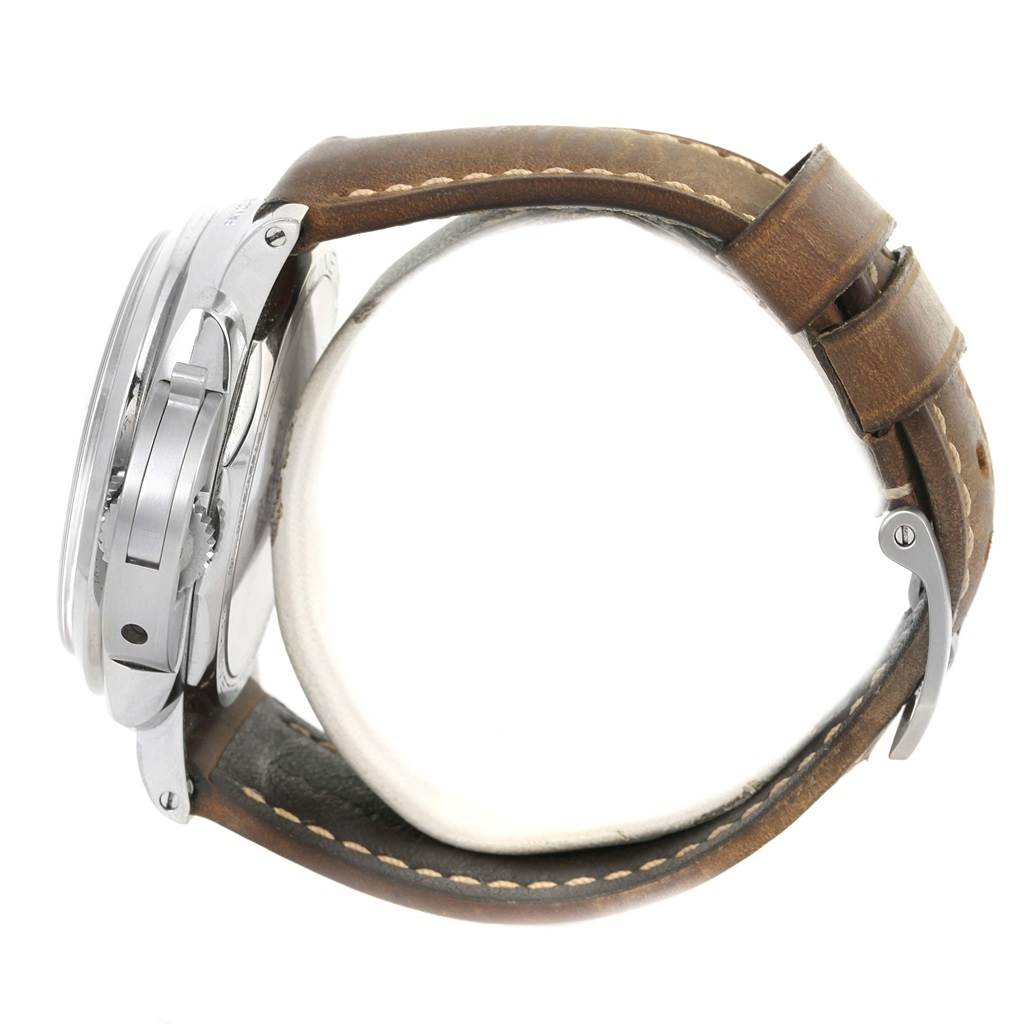 This side view of the Panerai Luminor PAM00423 Men's Stainless Steel Black Dial PAM00423 Men's Stainless Steel Black Dial watch shows its case, crown, and leather strap with stitching.