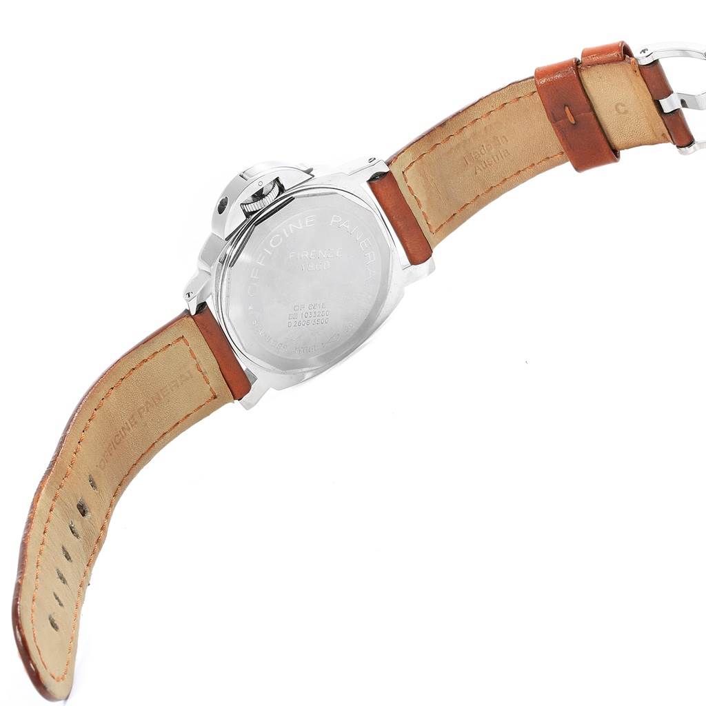 The image shows the back side of a Panerai Luminor PAM00003 Men's Stainless Steel White Dial PAM00003 Men's Stainless Steel White Dial with its brown leather straps laid open.