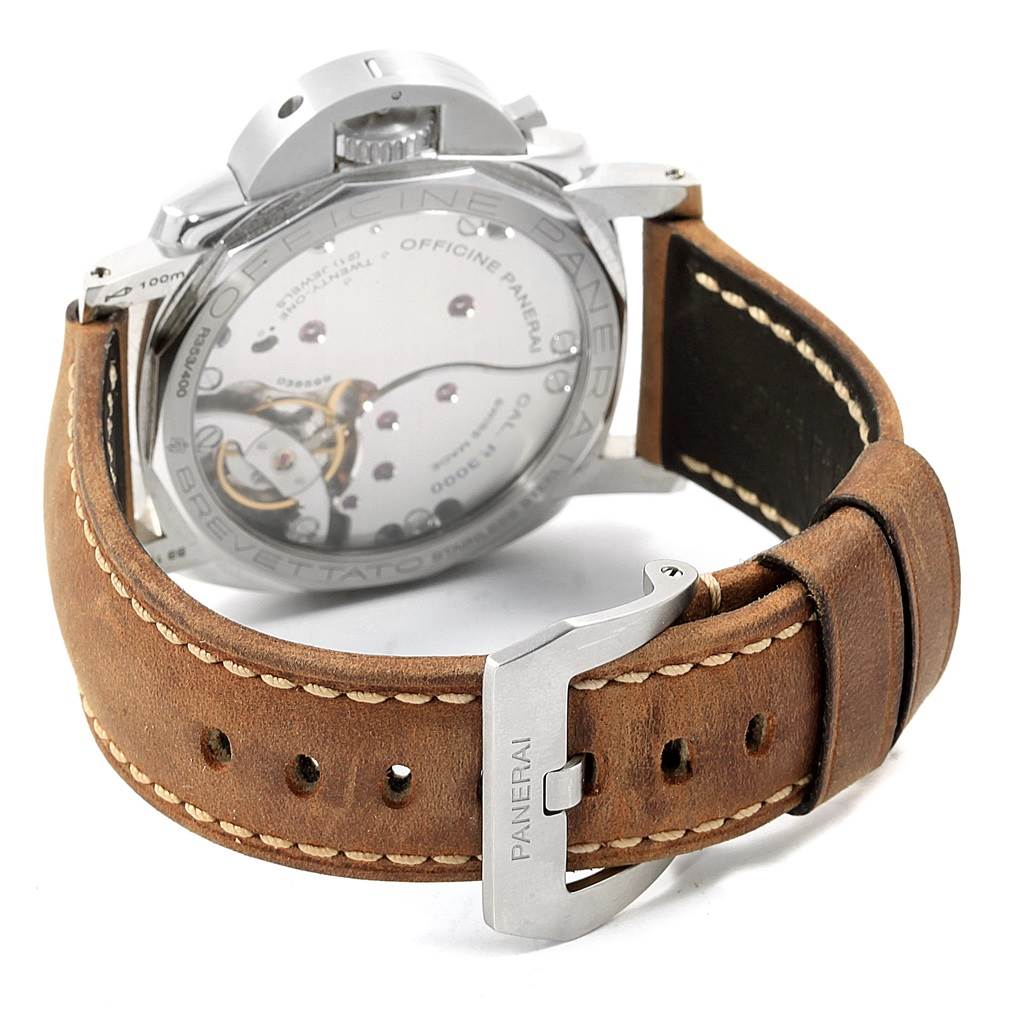 The image shows the back view of a Panerai Luminor PAM00372 Men
s Stainless Steel Black Dial PAM00372 Men
s Stainless Steel Black Dial watch, highlighting the movement and the leather strap with a Panerai buckle.