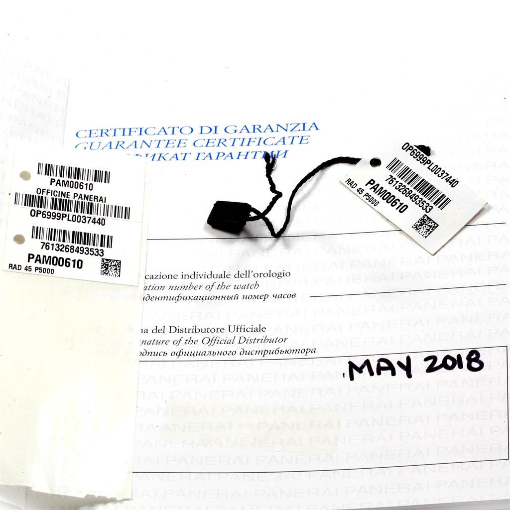 The image shows the guarantee certificate, identification tags, and a string tag for the Panerai Radiomir PAM00610 Men's Stainless Steel Black Dial PAM00610 Men's Stainless Steel Black Dial model PAM00610 watch.