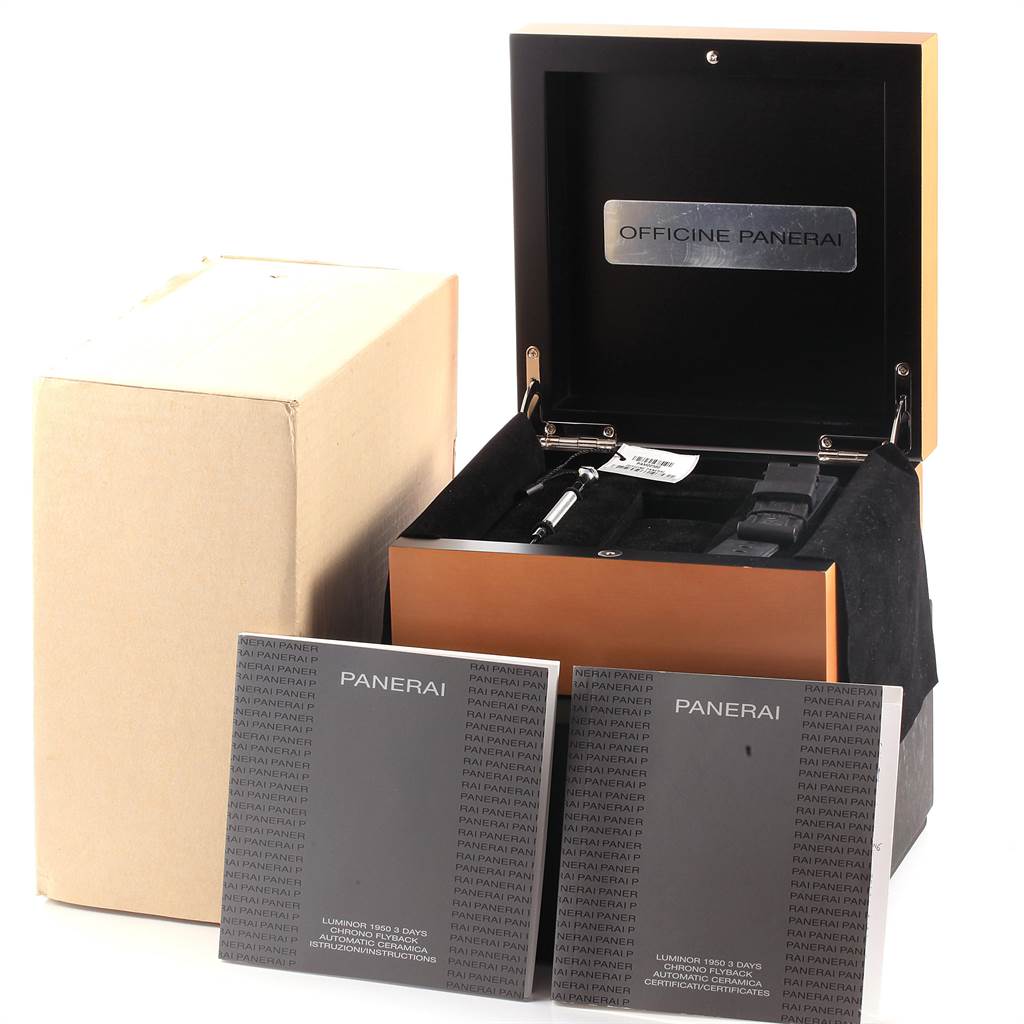 The image shows a Panerai Luminor PAM00580 Men's Stainless Steel Black Dial PAM00580 Men's Stainless Steel Black Dial watch package, including the watch box, manuals, and additional accessories.