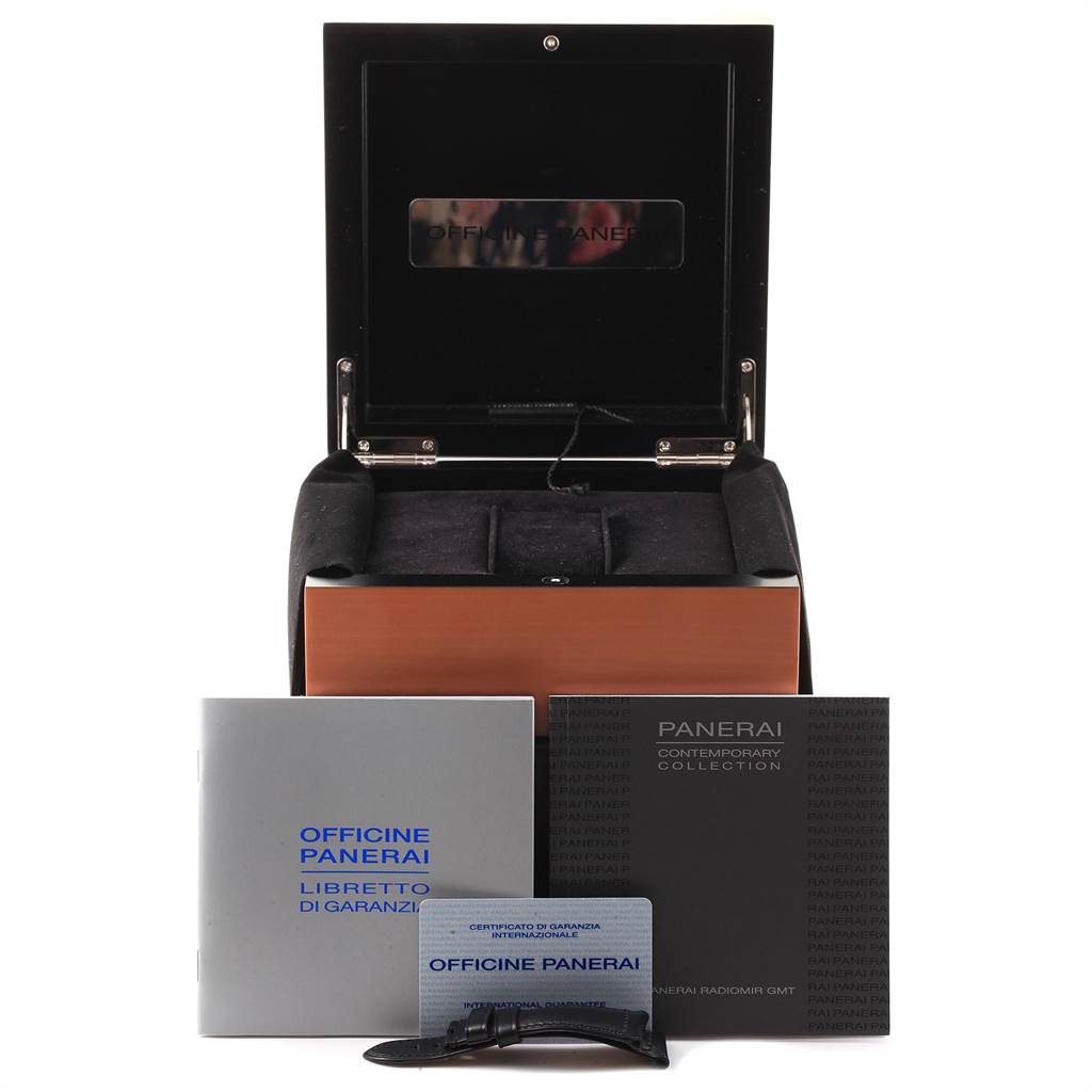 The image shows the accessories and packaging for a Panerai Radiomir PAM00184 Men's Stainless Steel Black Dial PAM00184 Men's Stainless Steel Black Dial watch, including the box, manuals, and warranty card.