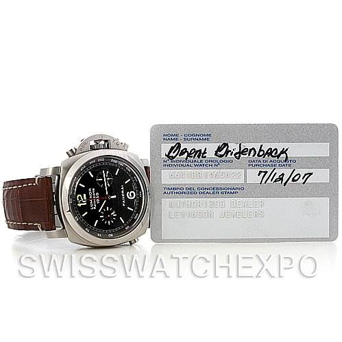 The image shows a Panerai Luminor PAM213 OR PAM00213 Men
s Stainless Steel Black Dial PAM213 OR PAM00213 Men
s Stainless Steel Black Dial watch at an angled view with a brown leather strap, alongside a warranty card.