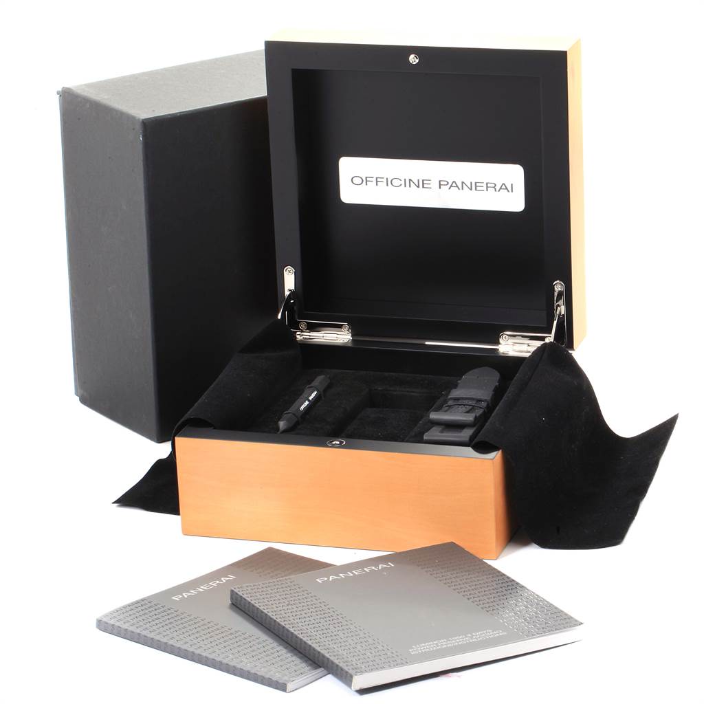 The image shows the packaging and accessories of a Panerai Luminor PAM00423 Men's Stainless Steel Black Dial PAM00423 Men's Stainless Steel Black Dial watch, including the box, tool, strap, and manuals from an angled view.