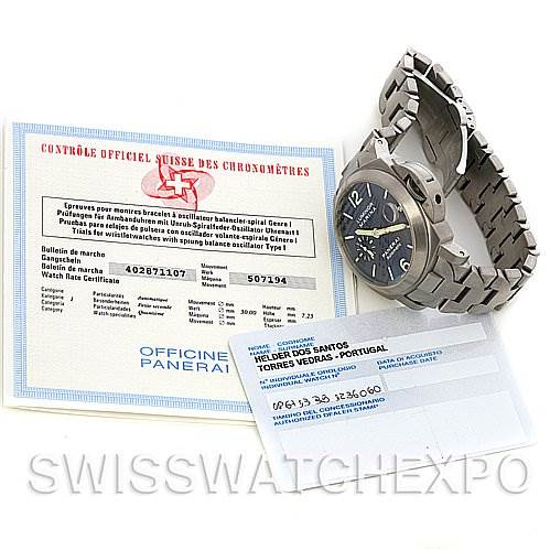 The image shows a Panerai Luminor PAM283 OR PAM 283 OR PAM 00283 Men's Titanium Blue Dial PAM283 OR PAM 283 OR PAM 00283 Men's Titanium Blue Dial watch with a stainless steel bracelet, displayed beside official documentation and warranty cards.