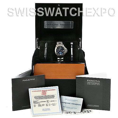 The image shows a Panerai Luminor PAM283 OR PAM 283 OR PAM 00283 Men's Titanium Blue Dial PAM283 OR PAM 283 OR PAM 00283 Men's Titanium Blue Dial watch in its open box, accompanied by booklets, certificates, and watch accessories.