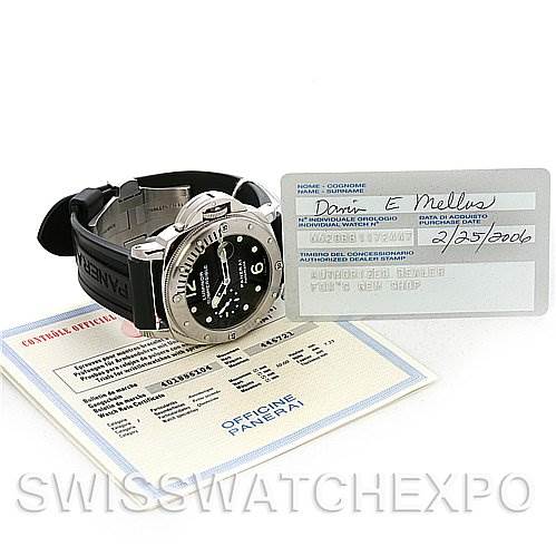 The image shows a Panerai Submersible PAM24 OR PAM 24 OR PAM 00024 Men's Stainless Steel Black Dial PAM24 OR PAM 24 OR PAM 00024 Men's Stainless Steel Black Dial watch at an angled side view, along with its papers and a warranty card.