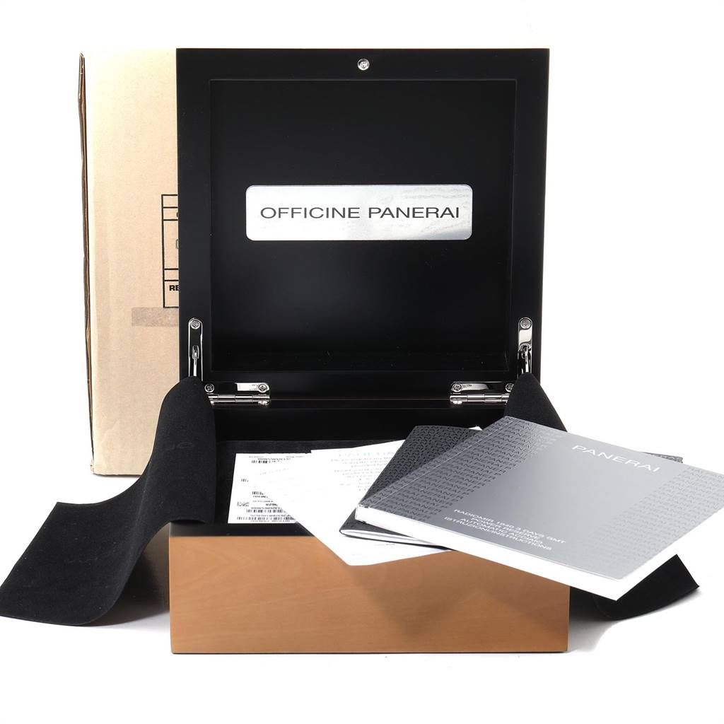 The image shows the open box of a Panerai Radiomir PAM00628 Men's Stainless Steel Black Dial PAM00628 Men's Stainless Steel Black Dial watch, along with manuals and packaging materials.