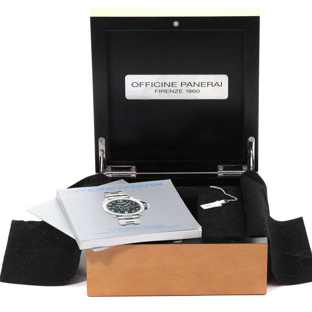The image shows an open wooden box for a Panerai Luminor PAM00250 Men's Stainless Steel Black Dial PAM00250 Men's Stainless Steel Black Dial watch, displaying the manual and a small tag or key.