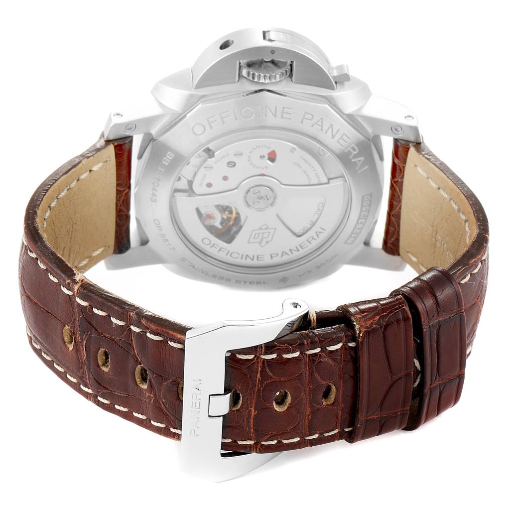 This image shows the rear view of a Panerai Luminor PAM00320 Men's Stainless Steel Black Dial PAM00320 Men's Stainless Steel Black Dial watch, highlighting the movement and brown leather strap with a clasp.