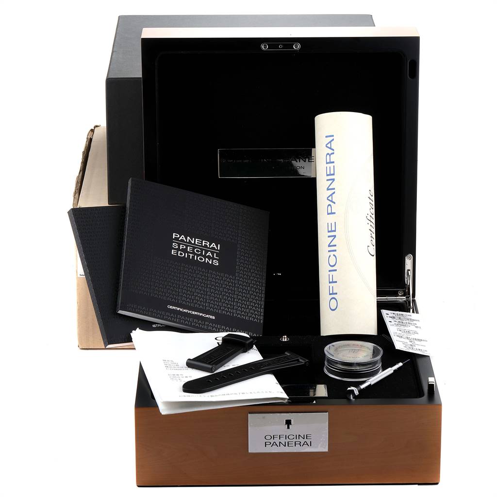 The image shows a Panerai Luminor PAM00673 Men's Stainless Steel Black Dial PAM00673 Men's Stainless Steel Black Dial watch box with accessories, including manuals, straps, a tool, and certificates.