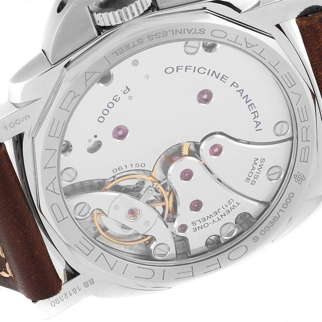 The image shows the back of a Panerai Luminor PAM00673 Men's Stainless Steel Black Dial PAM00673 Men's Stainless Steel Black Dial watch, displaying its intricate movement and engravings.